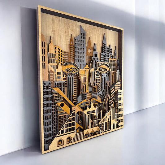 Angled view of 3D layered wooden artwork showing urban skyline with human facial features subtly carved into architecture