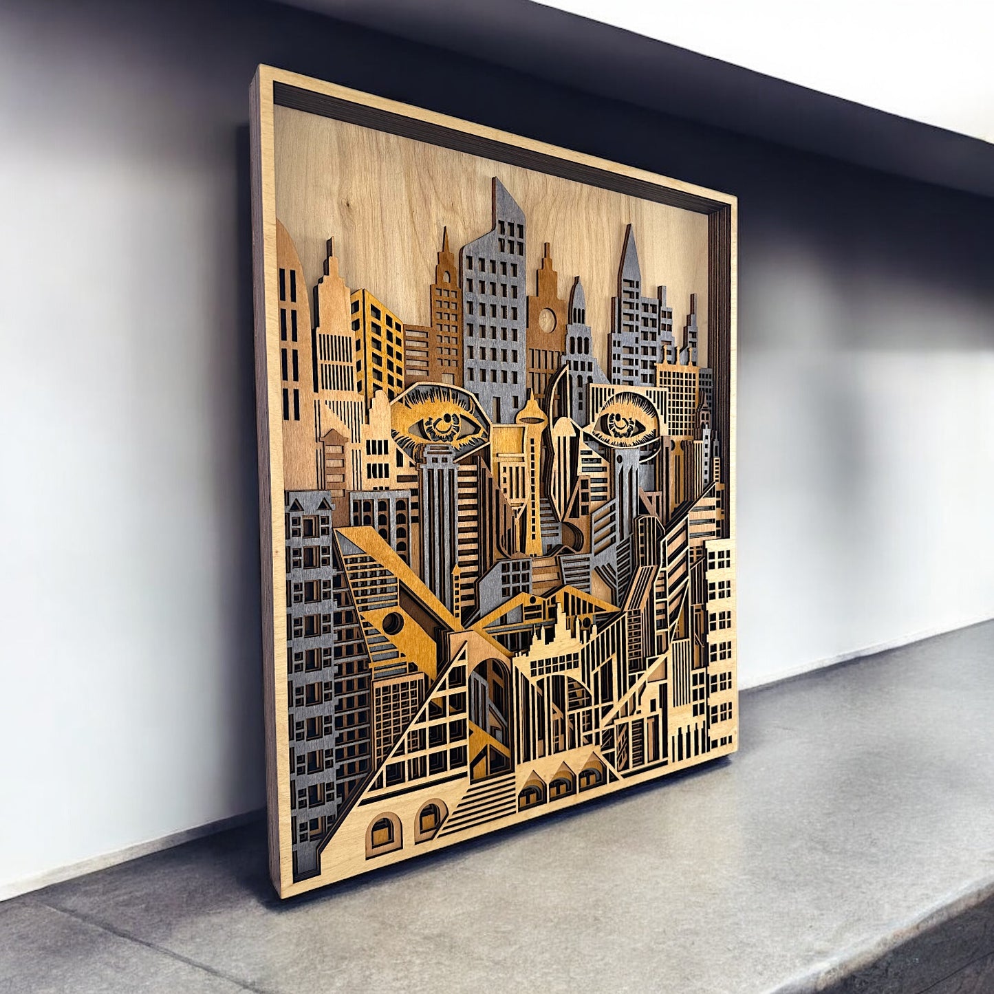 Modern architectural wood art with integrated human eyes and geometric shapes leaning against a bright wall