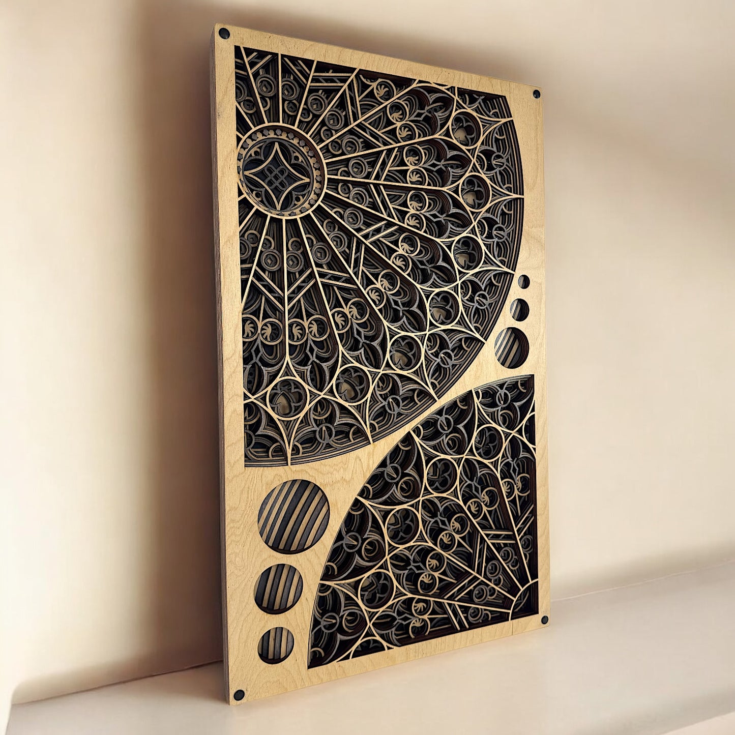 Warm lighting view with soft shadows, highlighting the ornate curves and arcs of the dual rose window halves in contrasting tones.