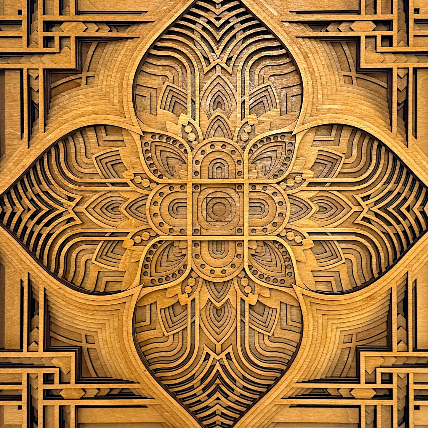 Close-up of Driftpetal’s center, revealing detailed linework, petal-like symmetry, and precise laser-cut craftsmanship.