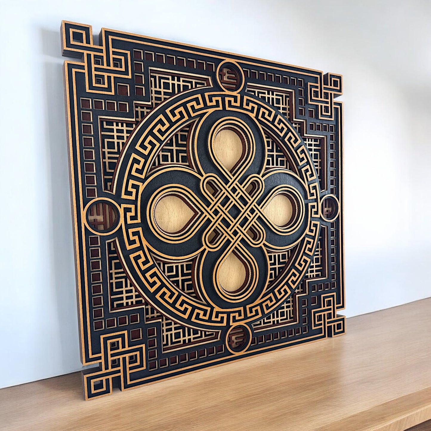 Three-quarter view of the art leaning on a light wood tabletop, emphasizing the clean lines and framed edge detailing.