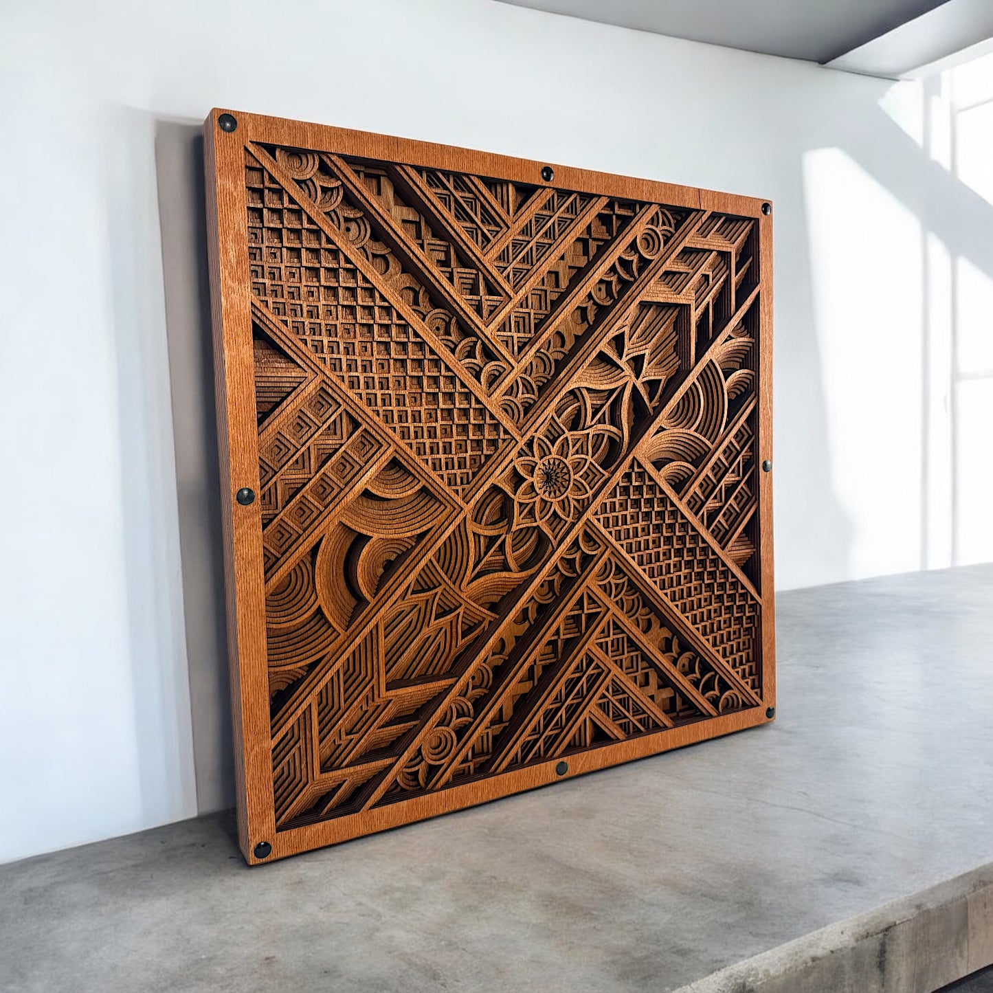 Side angle in natural light, emphasizing the texture, shadows, and fine line work in the geometric sections.