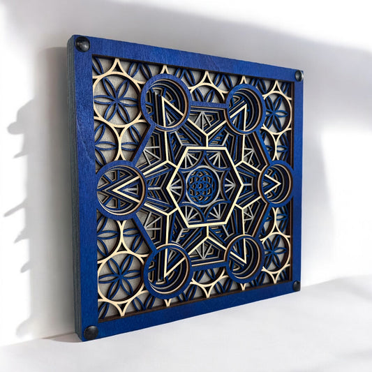 Angled side view of "Metatron Ascend" showcasing intricate layered depth in blue and natural plywood.