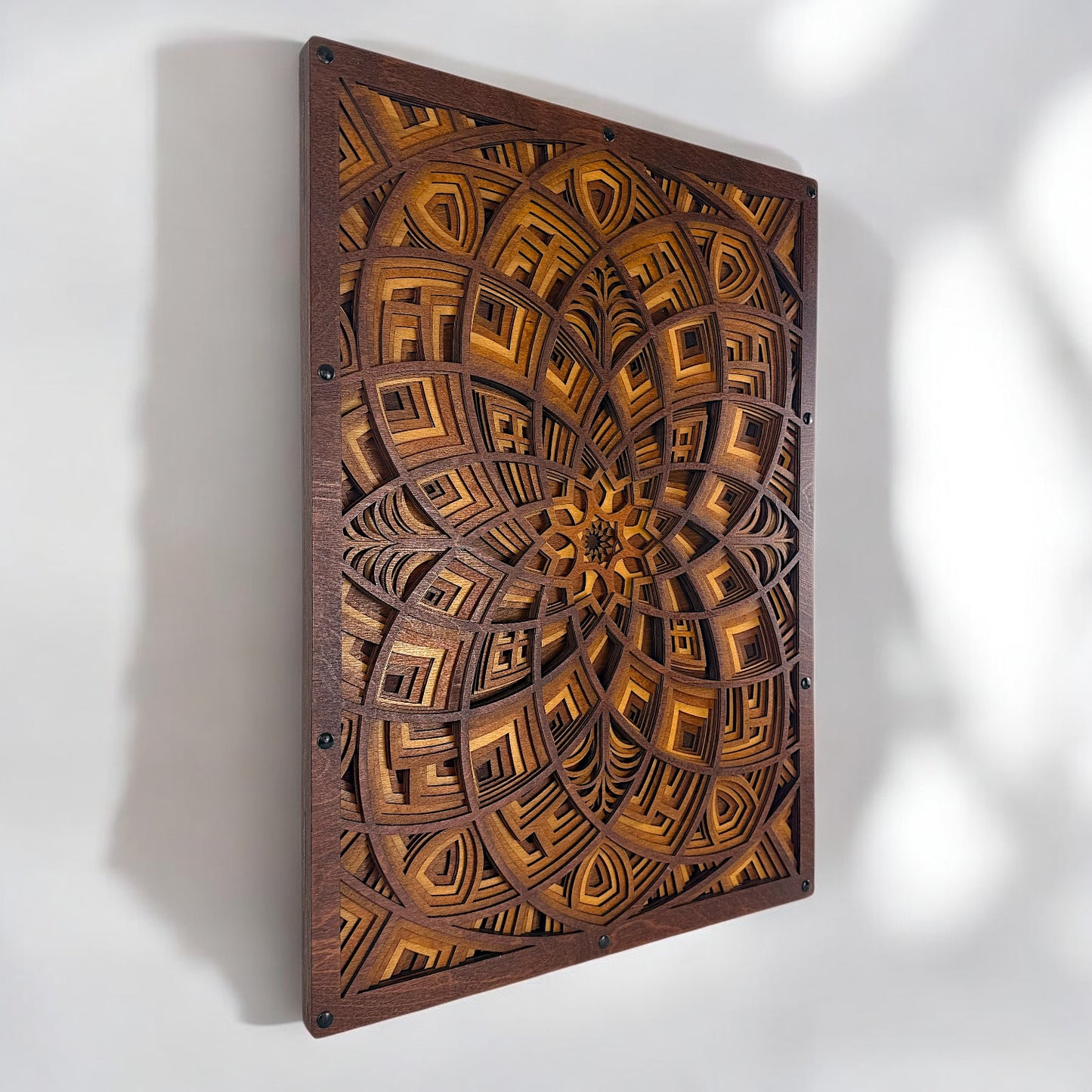 Side perspective of the Petal Maze displayed vertically on a wall, emphasizing its dimensional shadow play.
