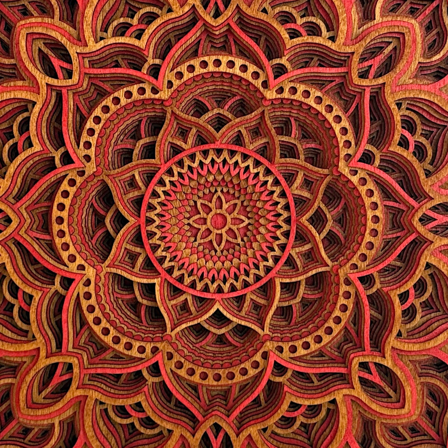 Close-up of the Temple Bloom centerpiece, capturing fine mandala detail and warm stained wood textures.