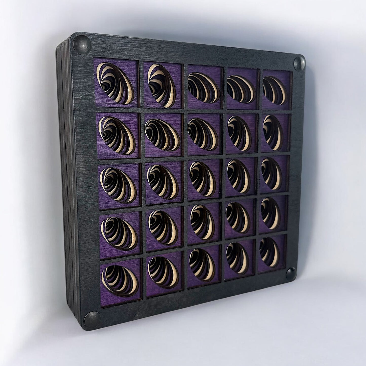 Perspective view of Vortex Array wall art highlighting intricate layered woodwork and precise laser-cut detailing in a 5x5 grid.