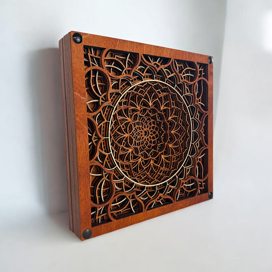 Angled side view highlighting the depth and intricate layering of the Vortex Reliquary wood art piece.