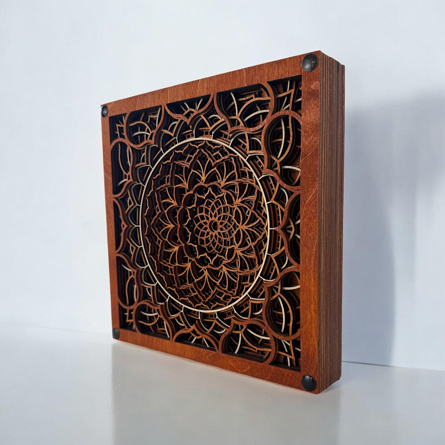 Perspective view showcasing the multi-dimensional structure and precision cuts of the Vortex Reliquary mandala design.