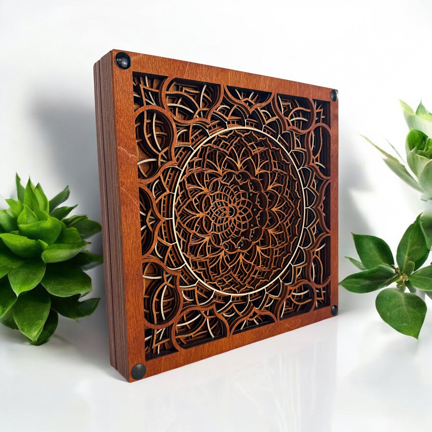 Decorative photo of the Vortex Reliquary with surrounding greenery, enhancing its organic and sacred geometry theme.