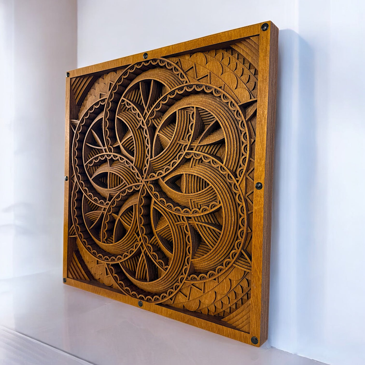 Right-side angled view highlighting the intricate cutwork and layered construction of the Axis Reverie wood art piece.