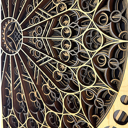 Detail shot of layered segments, emphasizing the handcrafted laser-cut lines, flowing symmetry, and natural wood textures.