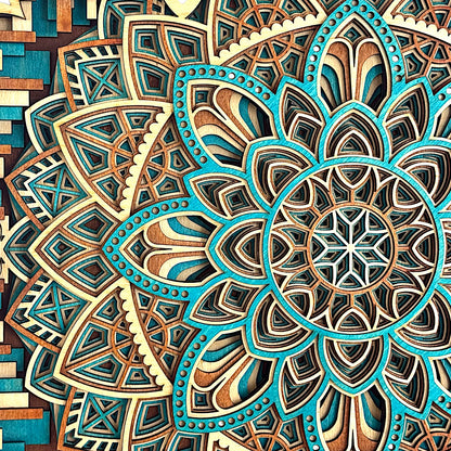 Macro detail of the top left mandala section, showing the precision of the teal dye work, sharp inner cuts, and radial geometry.