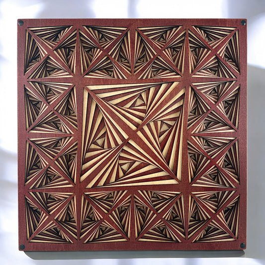 Front view of a 10-layer laser-cut wood artwork featuring a hypnotic triangular geometric pattern in natural and reddish wood tones.