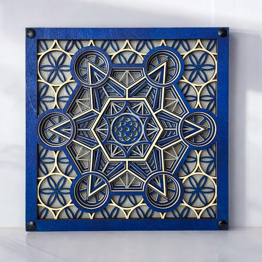 Front-facing view of "Metatron Ascend" – a blue, silver, and natural wood layered geometric art piece featuring sacred geometry and floral patterns.