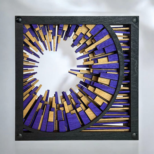 Front view of Metrorhythm V1 freestanding sculpture featuring layered gold and purple wood elements forming a circular burst.