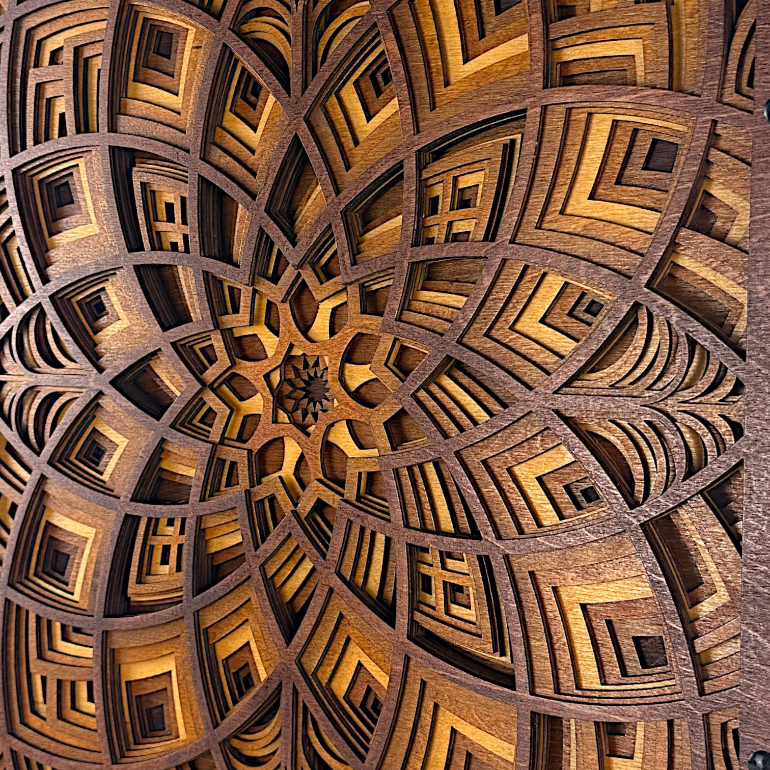 Extreme close-up view showcasing the fine-cut pattern and three-dimensional layering within the wood design.