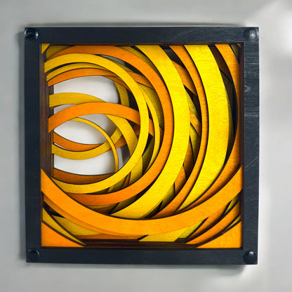 Front view of Radiant Drift wall art featuring bold, layered arcs in glowing shades of yellow and orange, laser-cut into stained wood.