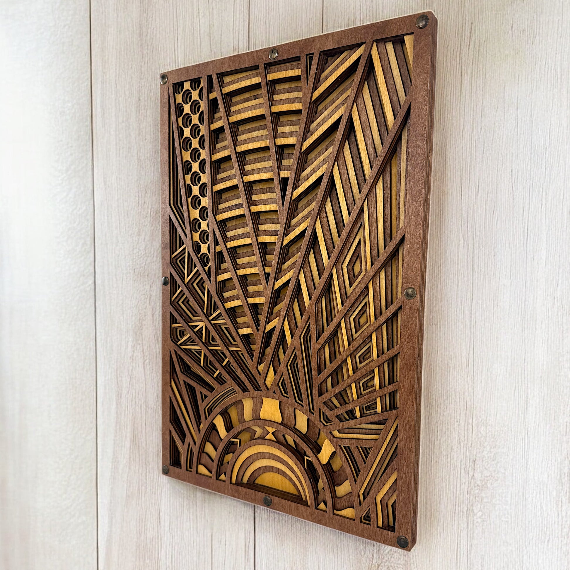 Sunveil wood art mounted on a modern interior wall