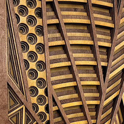 Close-up of hand-dyed Baltic Birch showing vibrant tones